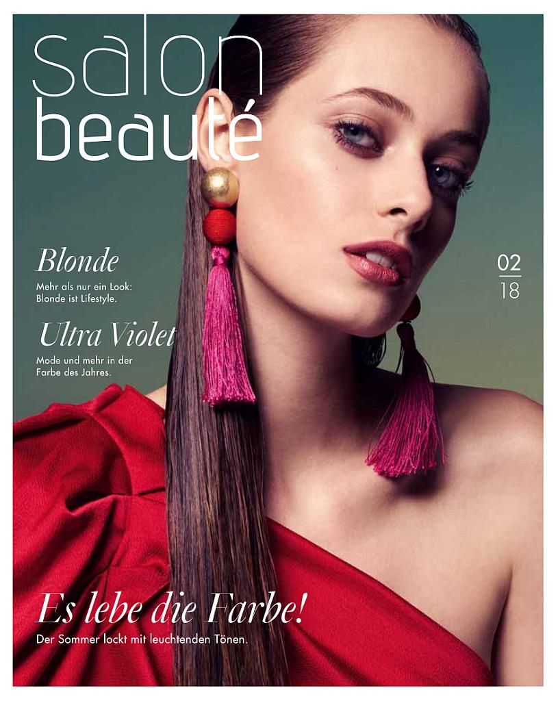 Titelseite des Magazins Ausgabe 2/2018 . Frau mit langen Haaren und rotem Oberteil